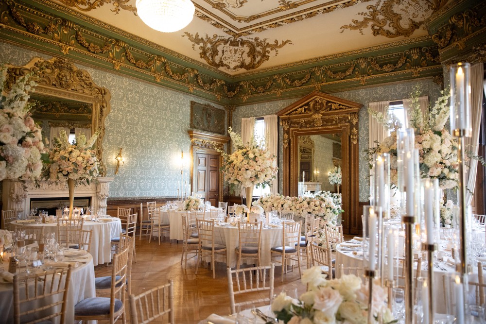 Hawkstone Hall & Gardens extravagently decorated dining room with tables set for the wedding breakfast
